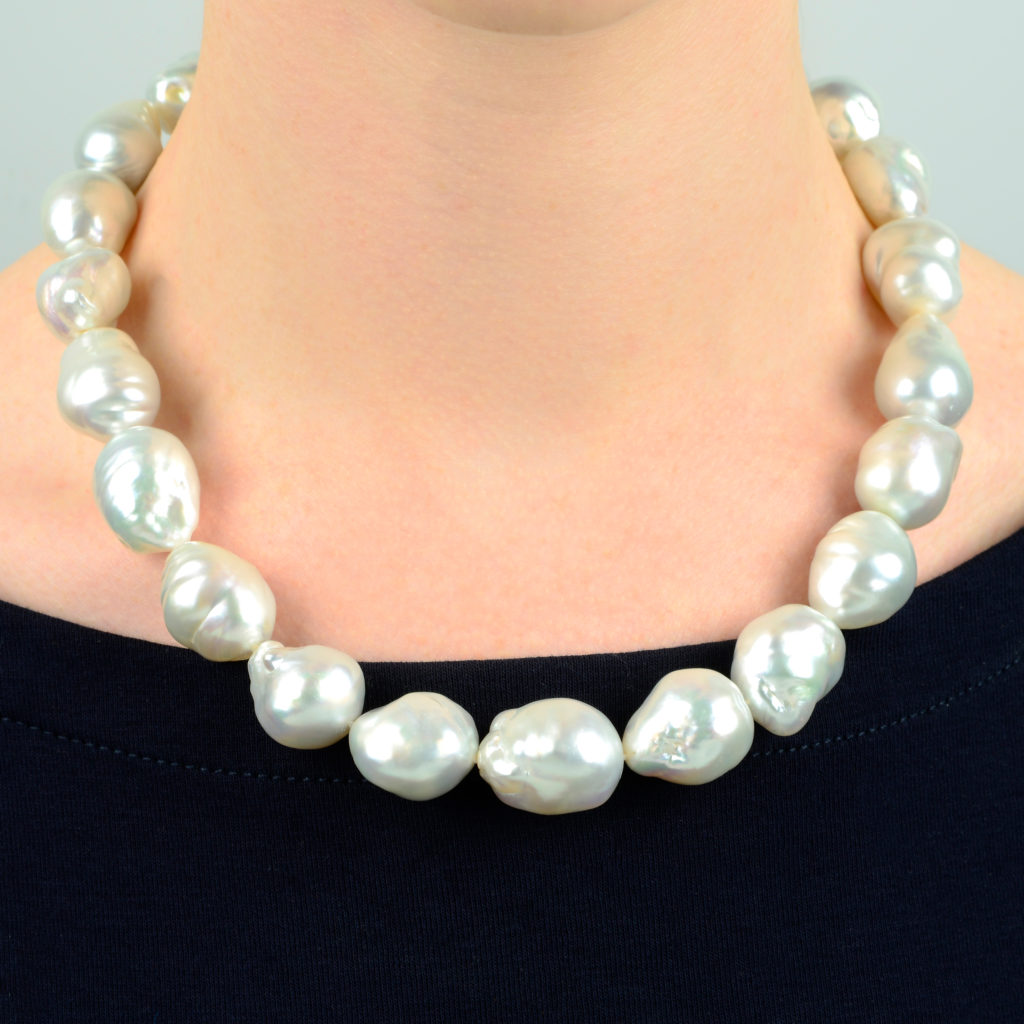 A South Sea baroque cultured pearl necklace, with diamond clasp, by Mikimoto.