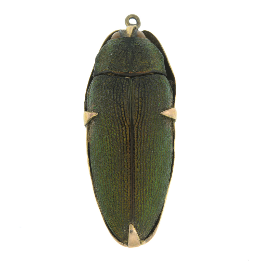 An early 20th century scarab beetle pendant.