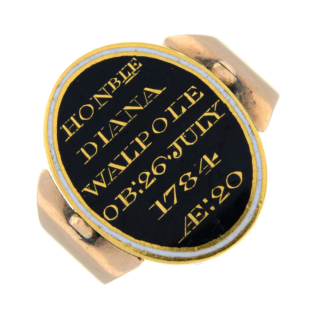 Diana Walpole's mourning ring. A Georgian gold black and white enamel mourning swivel ring, with braided hairwork locket, for the Honourable Diana Walpole.