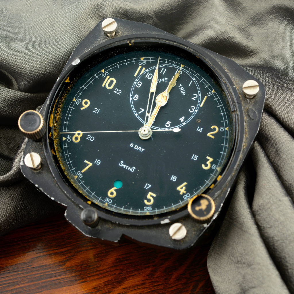 Cockpit clocks.  A military 8-day chronograph aircraft clock by Smiths, 83mm.