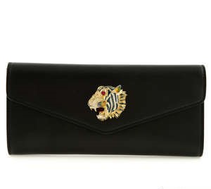 Gucci - Rajah clutch.