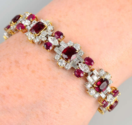 A Burmese ruby, baguette, marquise shaped and brilliant-cut diamond bracelet.